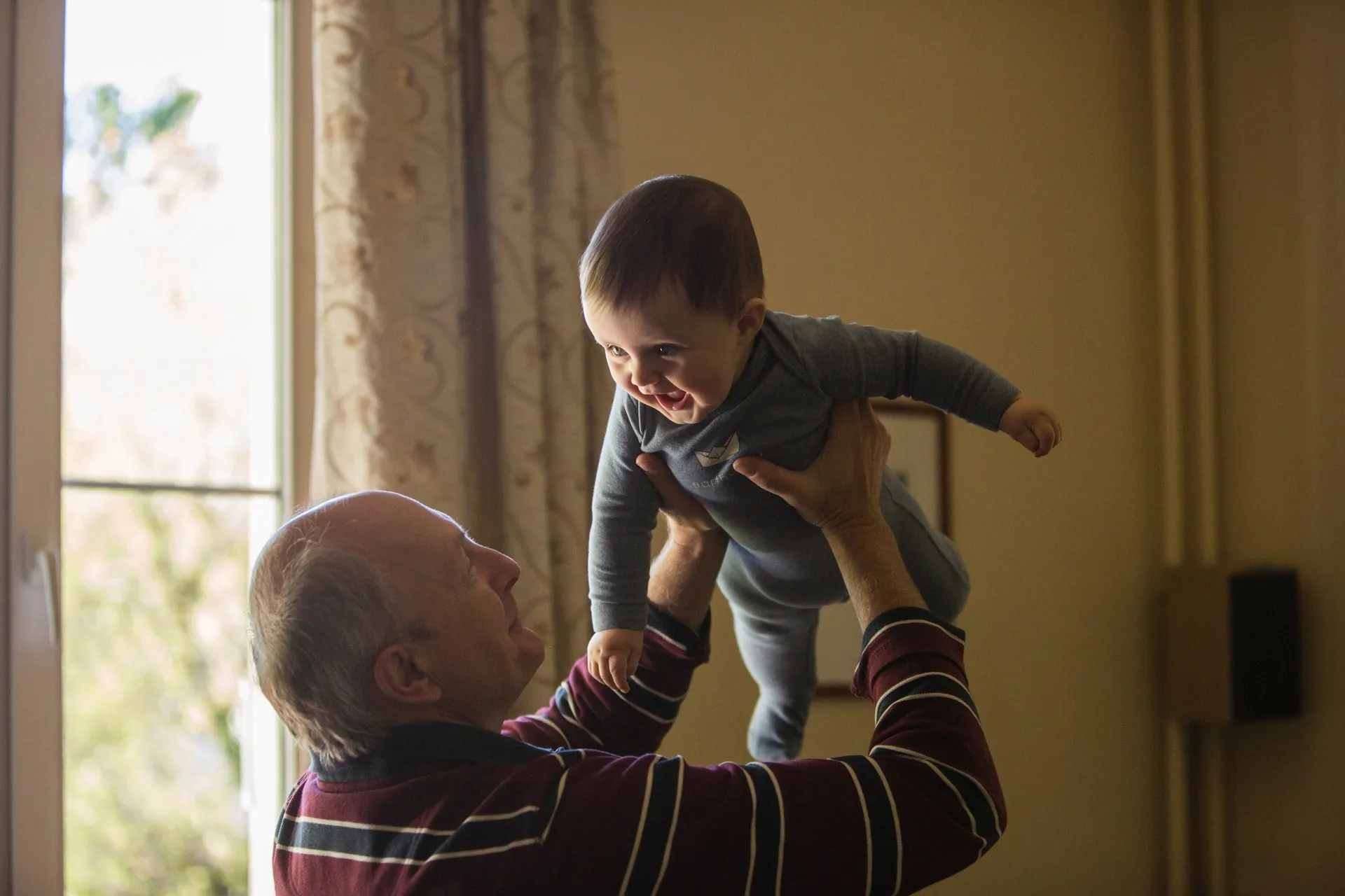 man holding a baby